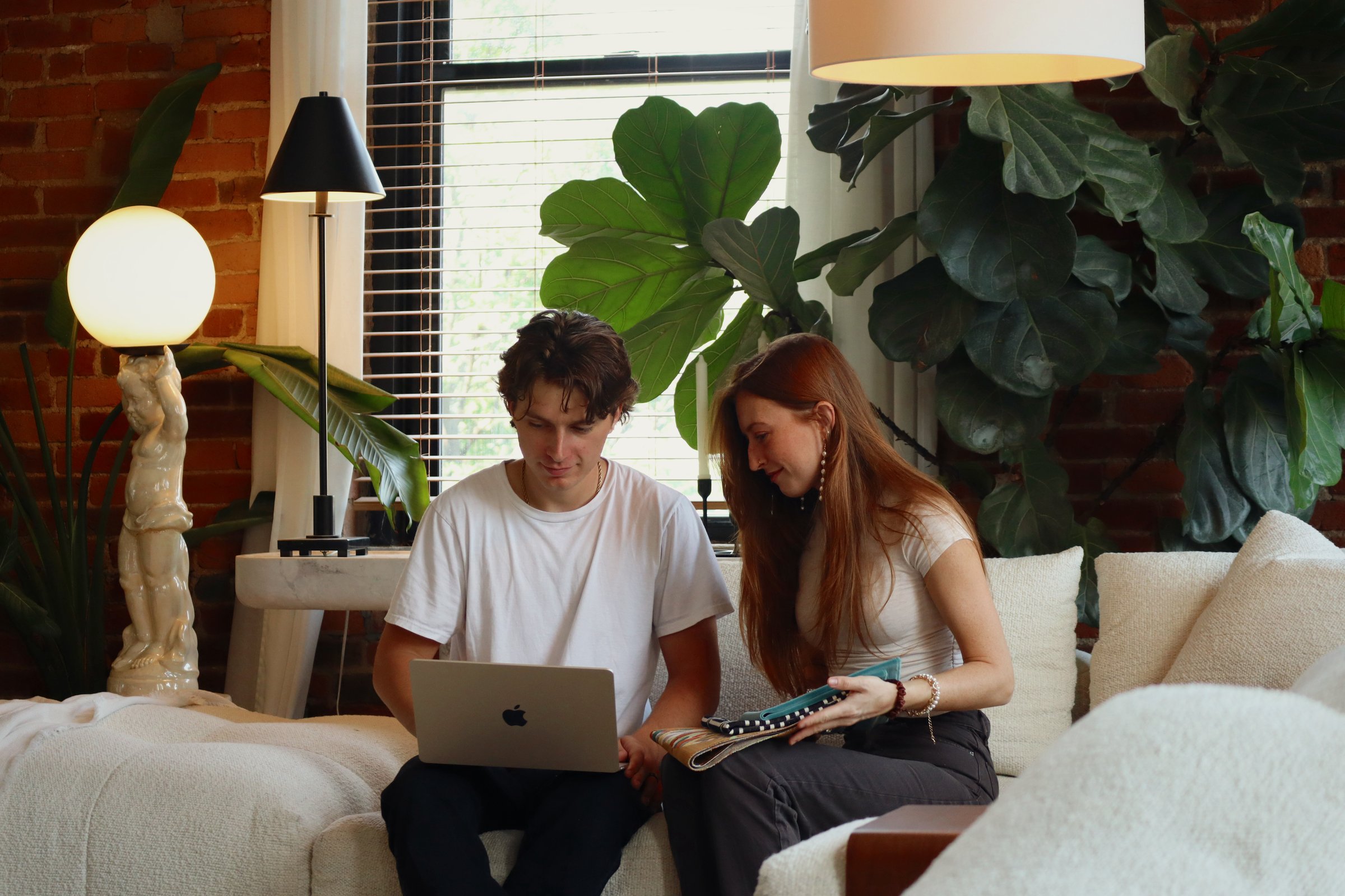 Jacob and Audrey Beneke working together on a design plan